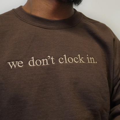 Our "we don't clock in." brown crewneck is made from.... This comfortable and stylish crewneck has been crafted for repeat wear and reflects the intersection of timeless fashion and durability. Crafted with care and precision, its minimalist design allows the powerful statement "we don't clock in." to take center stage, making it a conversation starter wherever you go. Wear with pride, knowing that you're not just wearing a garment, but a symbol of independence and self-determination.