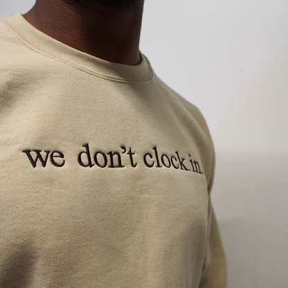 Our "we don't clock in." cream crewneck is made from.... This comfortable and stylish crewneck has been crafted for repeat wear and reflects the intersection of timeless fashion and durability. Crafted with care and precision, its minimalist design allows the powerful statement "we don't clock in." to take center stage, making it a conversation starter wherever you go. Wear with pride, knowing that you're not just wearing a garment, but a symbol of independence and self-determination.