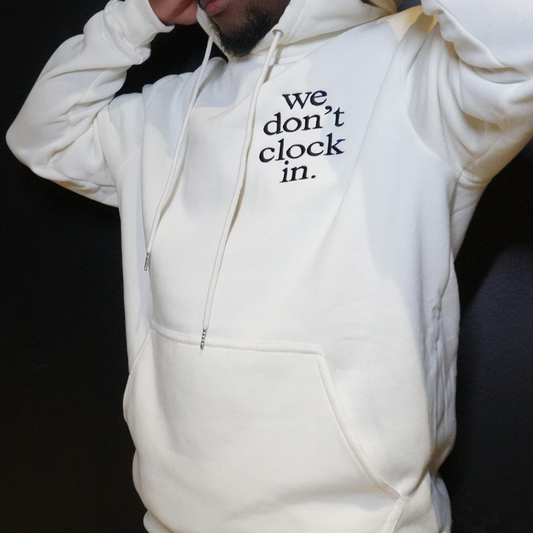 Our "we don't clock in." pocket logo hoodie is made from.... This comfortable and stylish hoodie is a statement on longevity, quality, and durability. Crafted with care and precision, its minimalist design allows the powerful statement "we don't clock in." to take center stage, making it a conversation starter wherever you go.