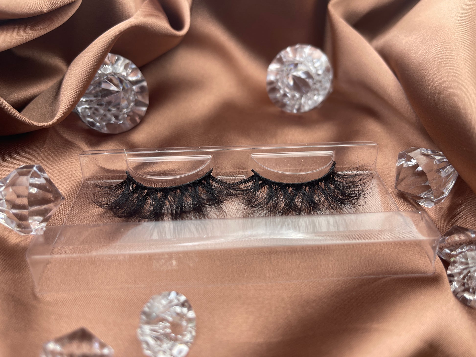 These Extravagance lashes by Teirrah Seinek are for those of us who love to be extra. These 22mm wispy lashes are perfect for a night out. Long lasting and re-usable up to 20+ times with proper care.  Lash Length: 22mm Full Strip Lashes