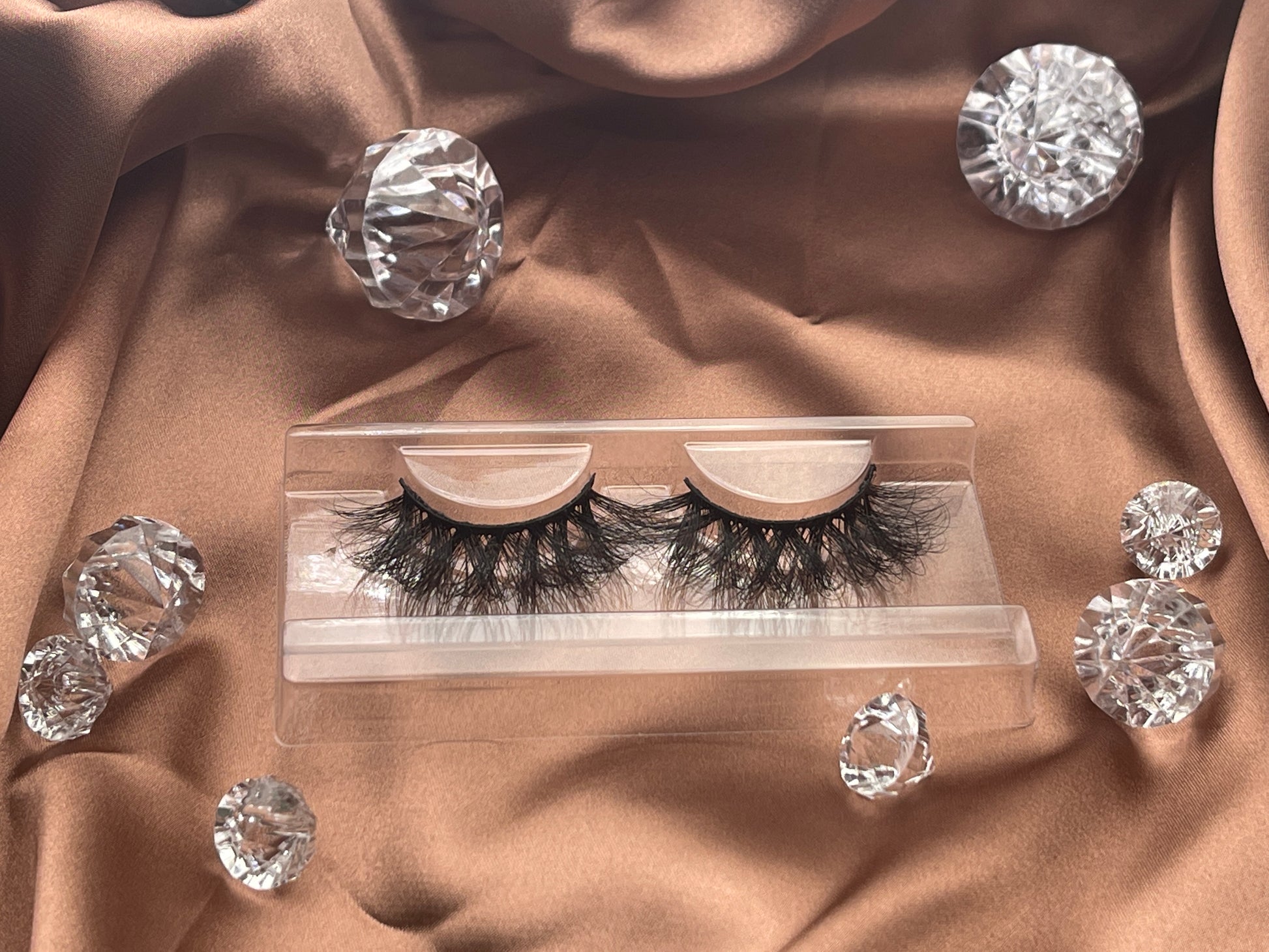 These Extravagance lashes by Teirrah Seinek are for those of us who love to be extra. These 22mm wispy lashes are perfect for a night out. Long lasting and re-usable up to 20+ times with proper care.  Lash Length: 22mm Full Strip Lashes