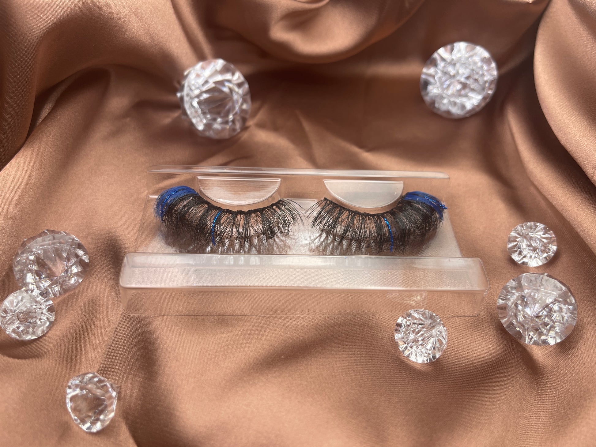 These Teirrah Seinek Royal high quality mink lashes have hints of blue and glitter. These lashes are great for a night out or to complete your favorite look. These lashes are lightweight and comfortable to wear all day.  Lash Length: 23mm Full Strip Lashes