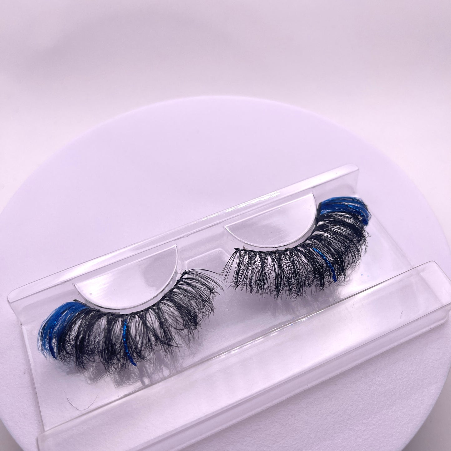 These Teirrah Seinek Royal high quality mink lashes have hints of blue and glitter. These lashes are great for a night out or to complete your favorite look. These lashes are lightweight and comfortable to wear all day.  Lash Length: 23mm Full Strip Lashes