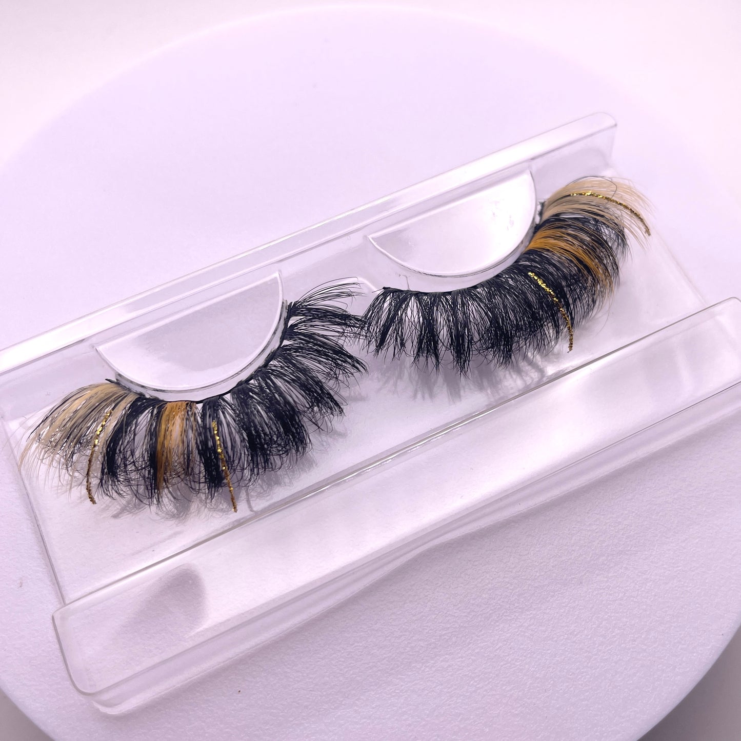 If you're unique and love to stand out, then these Teirrah Seinek Regal lashes are for you. These 23mm mink lashes are great for standing out in a crowd and will surely light up a room. These Regal lashes are easy to apply and add length, volume, and thickness to your lash look, and are undetectable, blending in with your natural lash line.  Lash Length: 23mm Full Strip Lashes